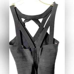 Tight bodycon Herve Leger black dress with spider back. Stunning